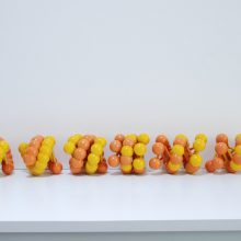 Six models of the 50 nm nucleosome fibre. Each model represents a different theoretical inter-nucleosomal spacing; nucleosomes are shown as yellow and orange spheres. Molecular model showing Nucleosome Fibre